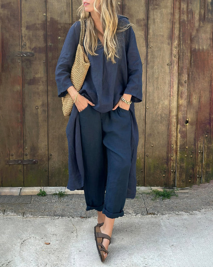 Navy two-piece lounge set with V-neck tunic top and cropped wide-leg pants