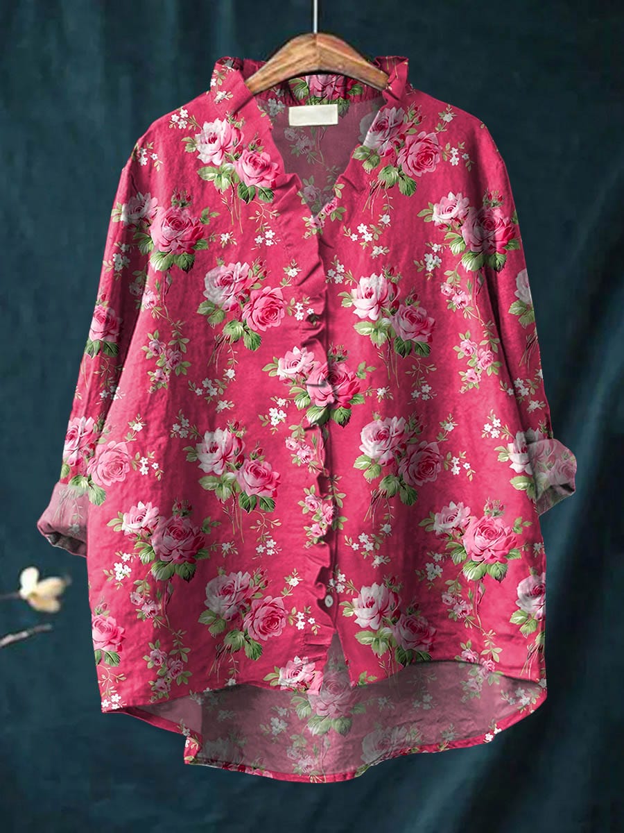 Relaxed linen blouse in pink with rose floral print, button front and collared neckline