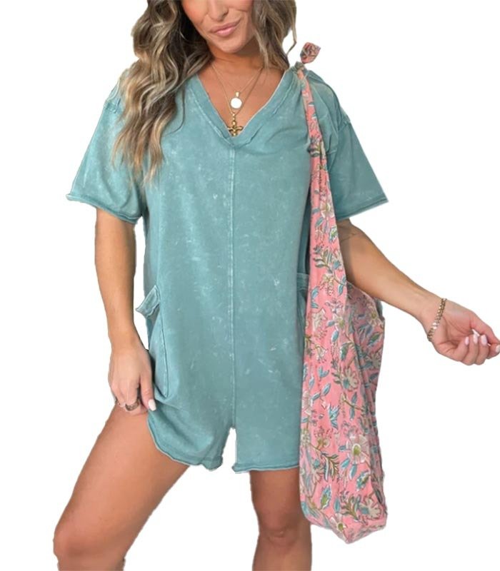Washed pocket romper, teal, V-neck, short sleeves, front view with patch pockets