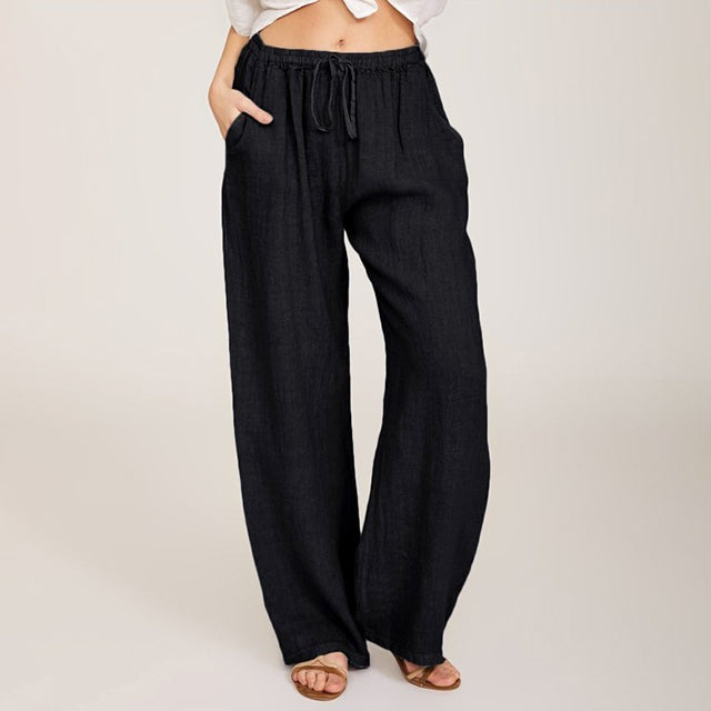 Black wide-leg lounge pants with elastic drawstring waist, relaxed wide legs