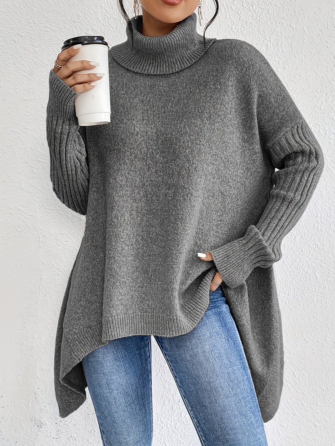 Oversized turtleneck sweater in dark grey knit with ribbed cuffs and curved hem