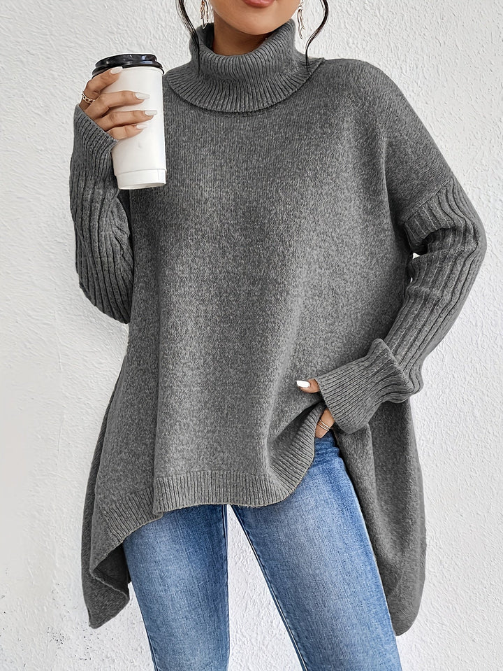 Oversized turtleneck sweater in dark grey knit with ribbed cuffs and curved hem