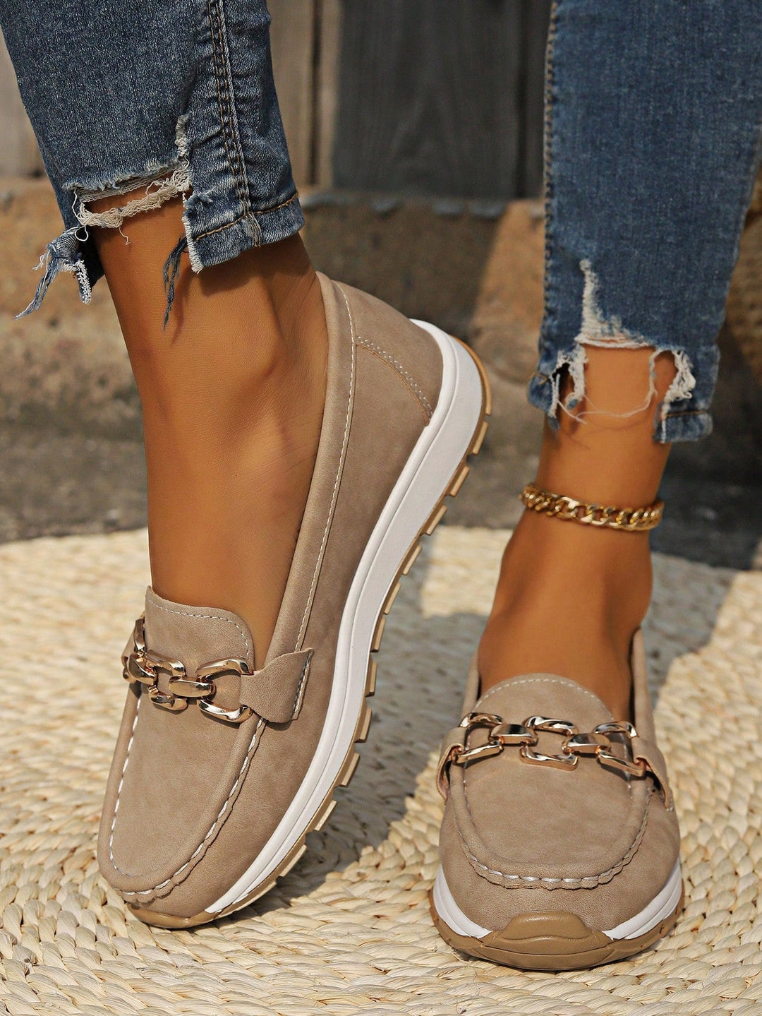 Khaki chain detail slip-on loafer shoes with gold-tone hardware and white sole.