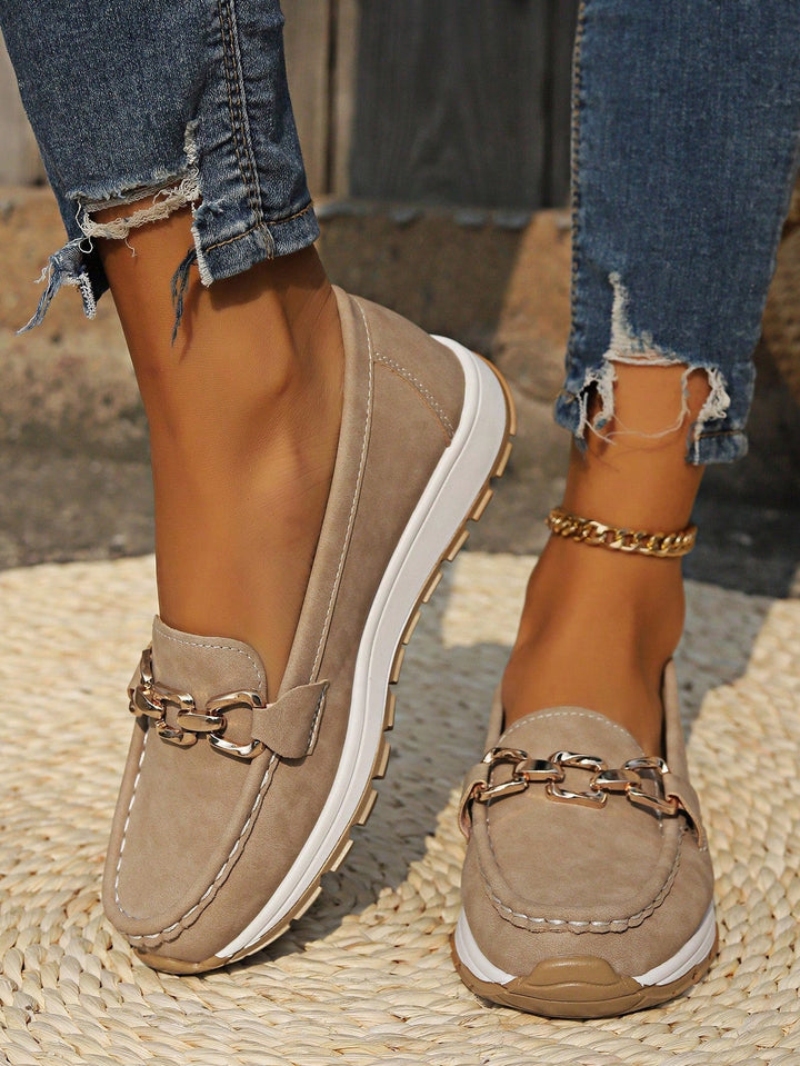 Khaki chain detail slip-on loafer shoes with gold-tone hardware and white sole.
