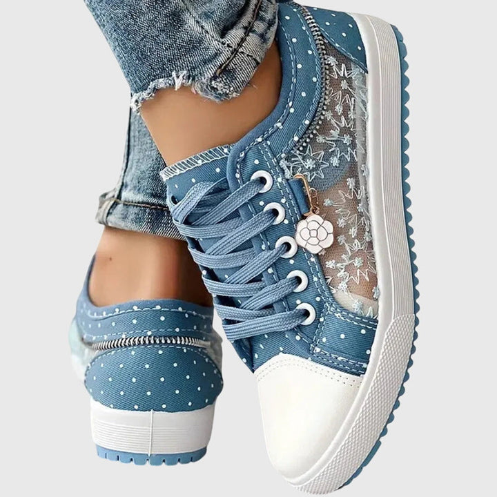 Light blue lace-up casual sneakers with side star print, zipper detail and white sole