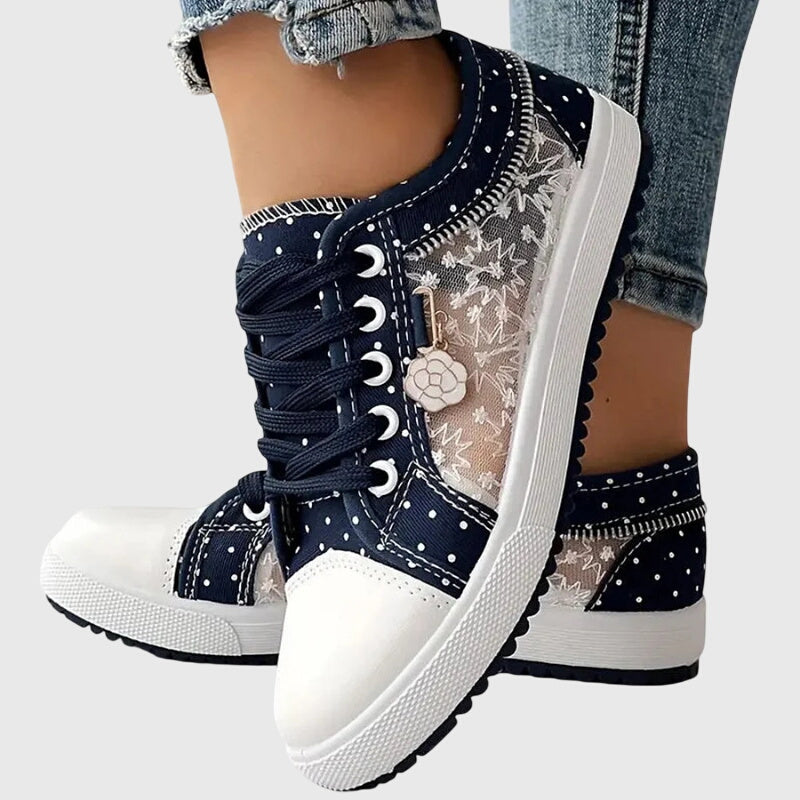 Dark blue lace-up casual sneakers with zipper trim, star print and white rubber toe