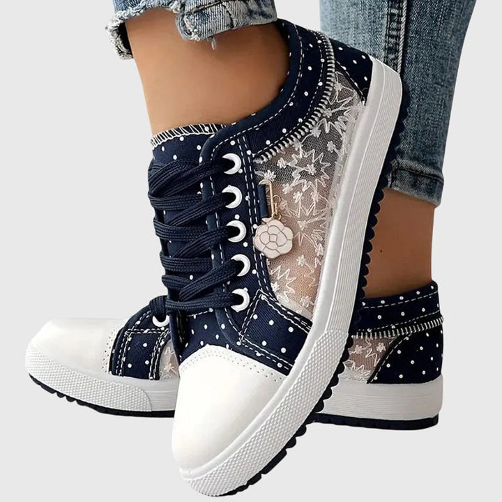 Dark blue lace-up casual sneakers with zipper trim, star print and white rubber toe