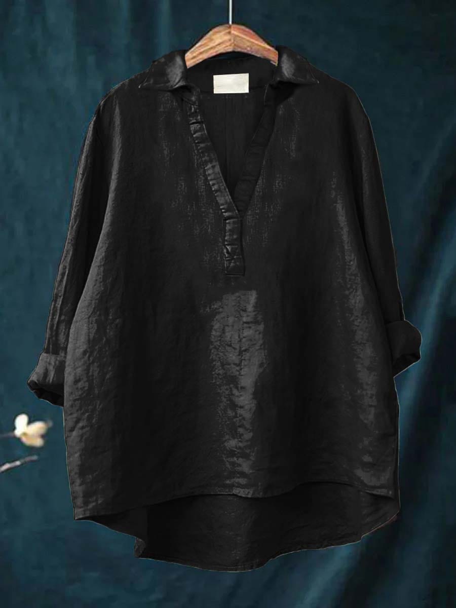 Black linen blouse with V-neck and short button placket, relaxed fit