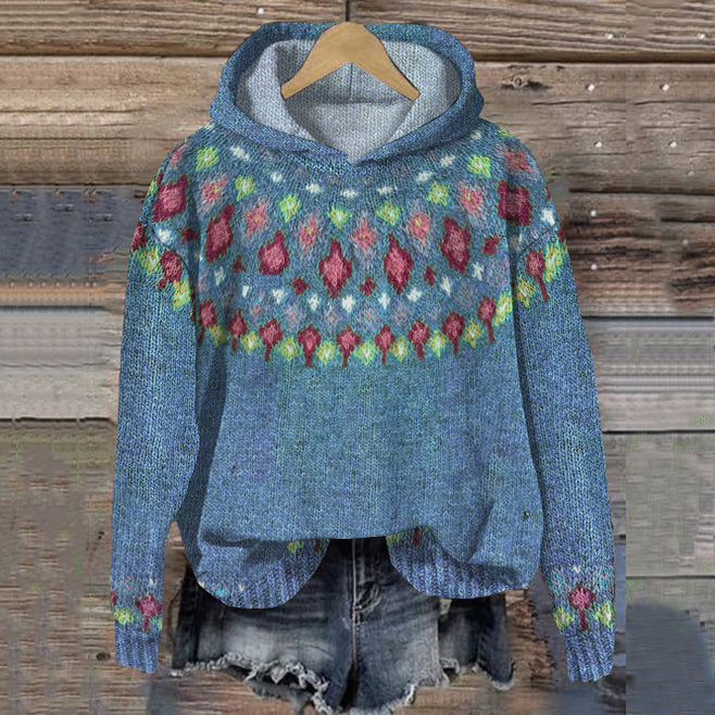 Nordic knit hoodie sweater in blue with multicolor floral yoke and trim