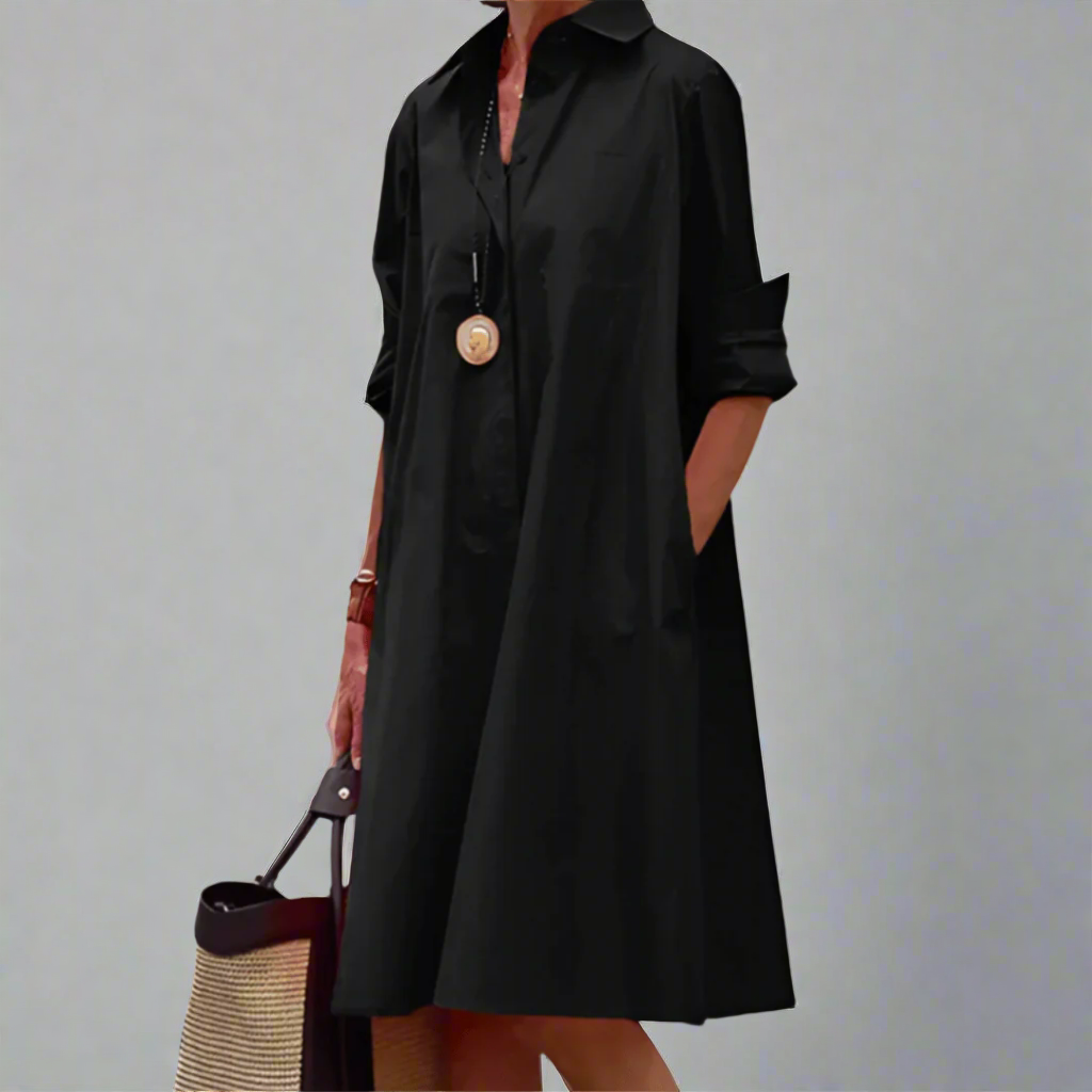 Black polo dress with pointed collar, button placket, three-quarter sleeves, flared hem.