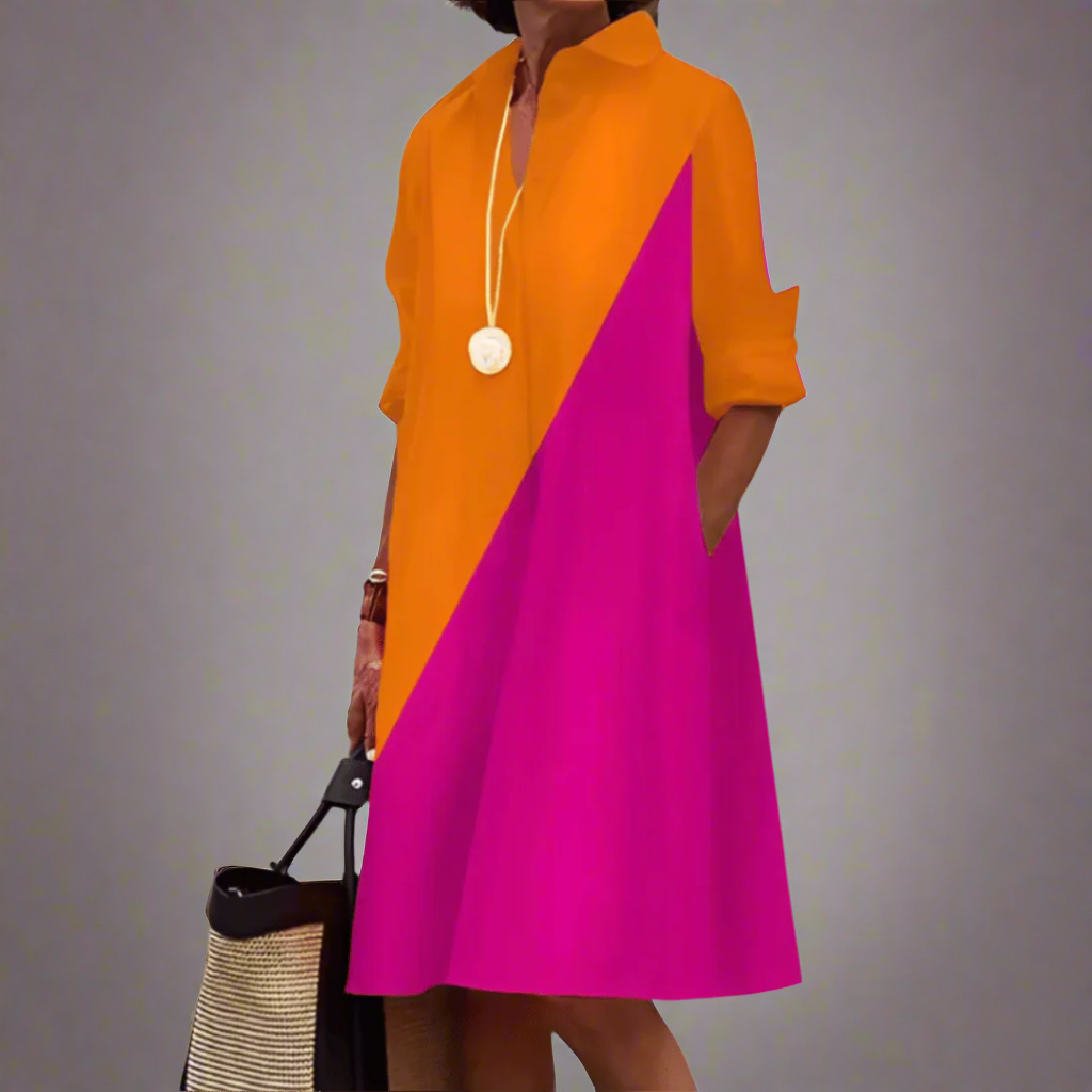 Orange and pink polo dress with pointed collar, button placket, three-quarter sleeves.