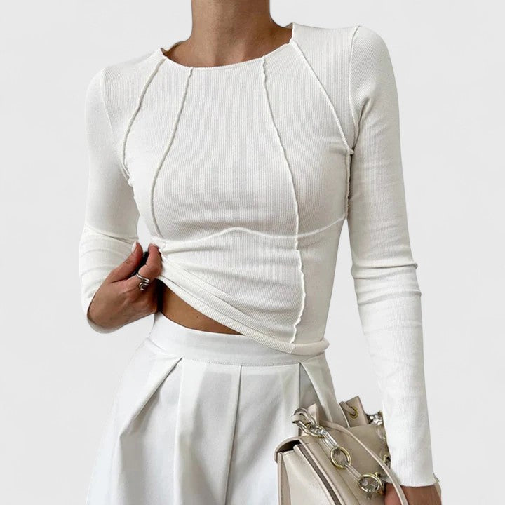 White ribbed seam-detail top, long sleeves, crew neck, fitted bodice