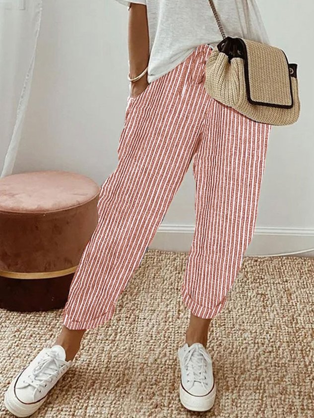 Red striped relaxed drawstring pants with cuffed hem and adjustable waist tie.