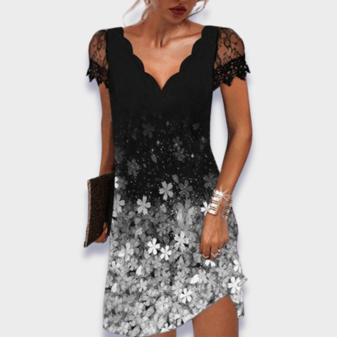 Floral print dress with black lace V-neck bodice and gray flower skirt hem slit