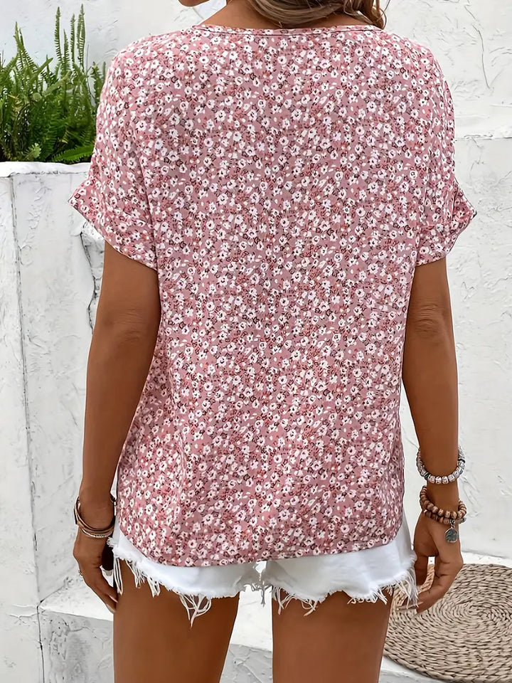 Pink floral button blouse, back view, short sleeves and all-over small blooms
