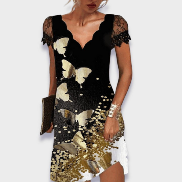 Floral print dress with black lace V-neck bodice and gold butterfly flower hem slit