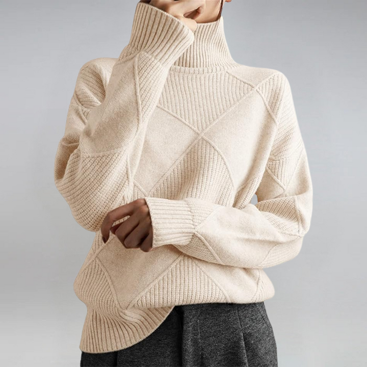 Beige textured knit turtleneck sweater with ribbed cuffs and geometric knit pattern