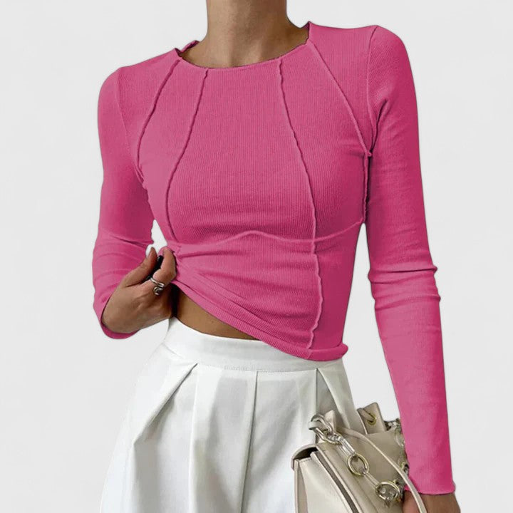 Pink ribbed seam-detail top with long sleeves and crew neck, fitted