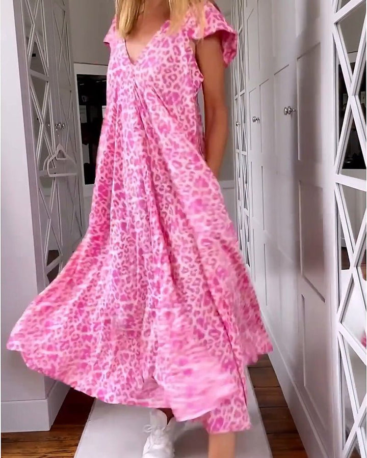 Pink leopard-print V-neck maxi dress with short flutter sleeves and ruffled hem