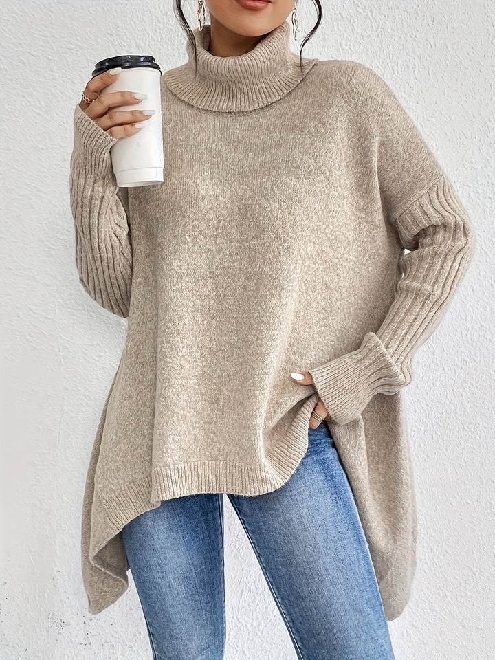 Oversized turtleneck sweater, light knit with ribbed cuffs and asymmetrical hem