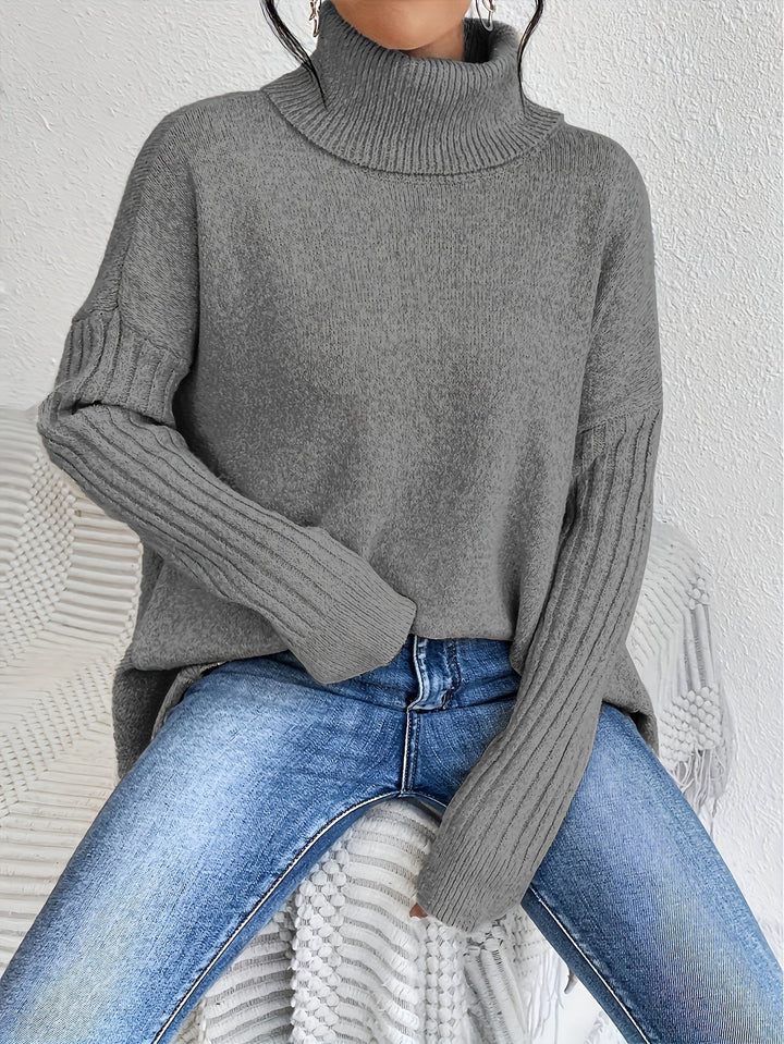 Oversized turtleneck sweater in dark grey knit with ribbed cuffs and tall collar