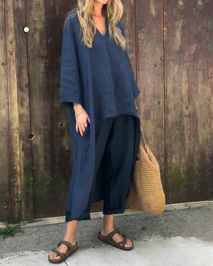 Navy V-neck tunic and cropped wide-leg pants set with loose, baggy fit