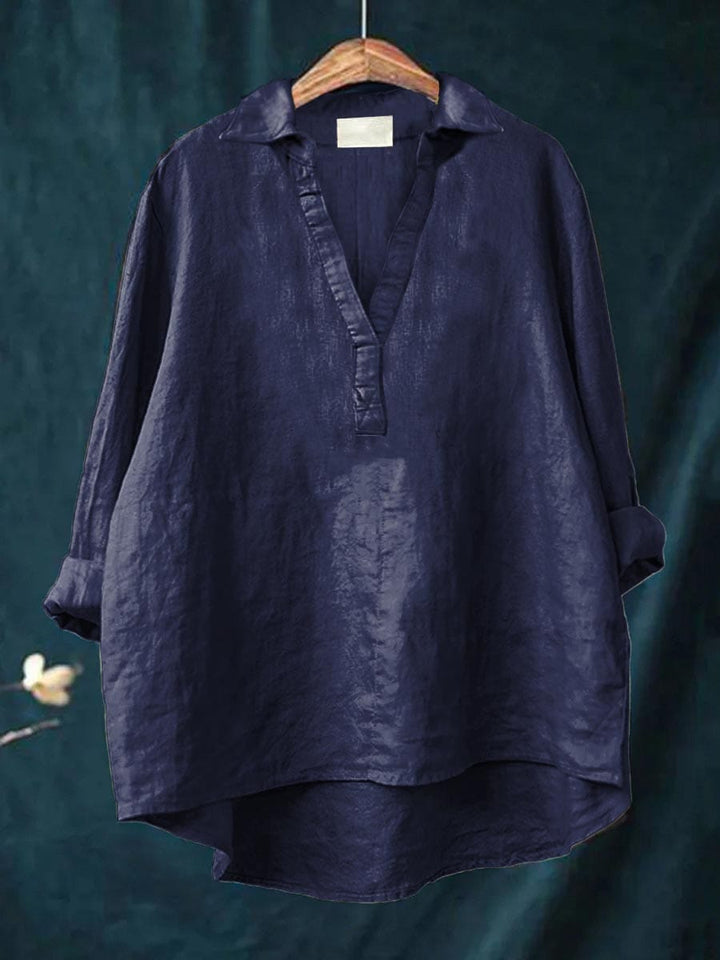 Navy linen blouse with V-neck and short button placket, relaxed fit