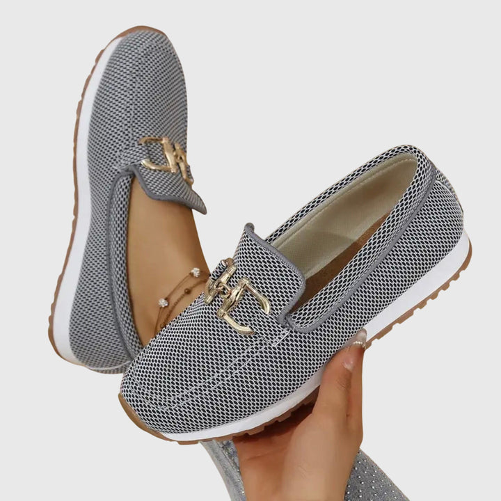 Gray chain-detail slip-on loafers with gold buckle on woven upper, flat sole