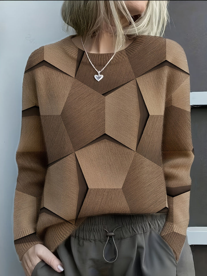 Brown and tan geometric knit sweater with wide V-neck and long sleeves
