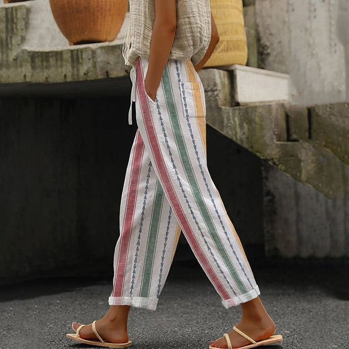 Relaxed striped pants in red, green, and gold with buttonless drawstring waist, cropped view
