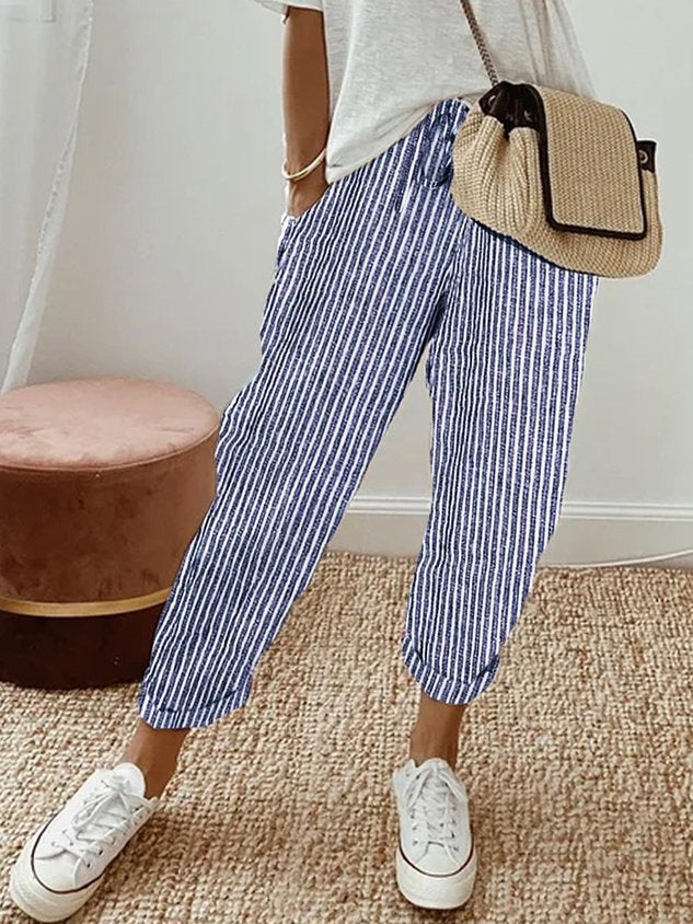 Blue striped relaxed drawstring pants with cuffed hem and adjustable waist tie.