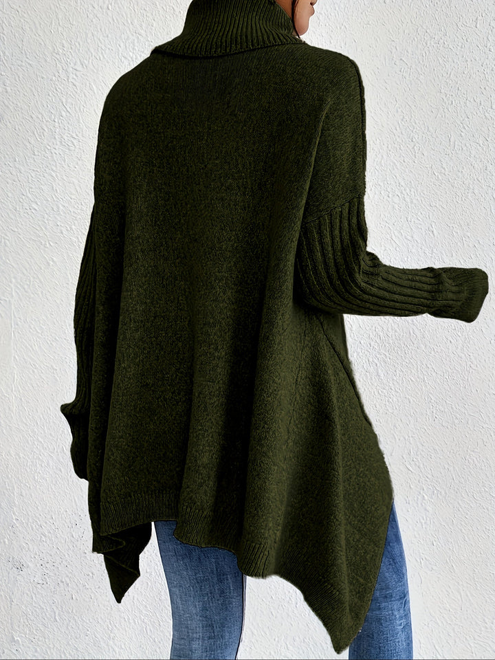 Olive green oversized turtleneck sweater shown from back, ribbed cuffs and high-low hem