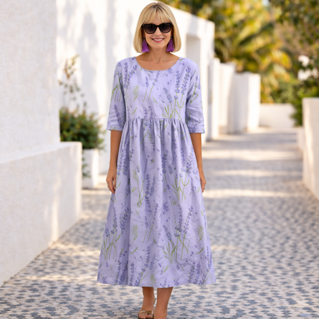 Floral dress in lavender with botanical print, three-quarter sleeves and gathered waist
