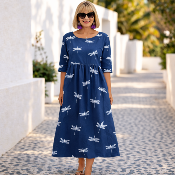 Dark blue summer dress with white dragonfly print and gathered waist