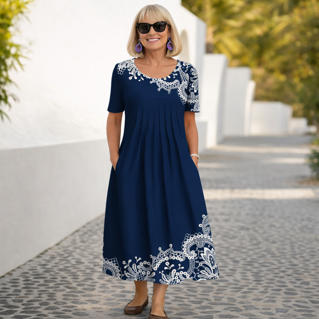 Navy midi dress with lace-like neckline and embroidered border