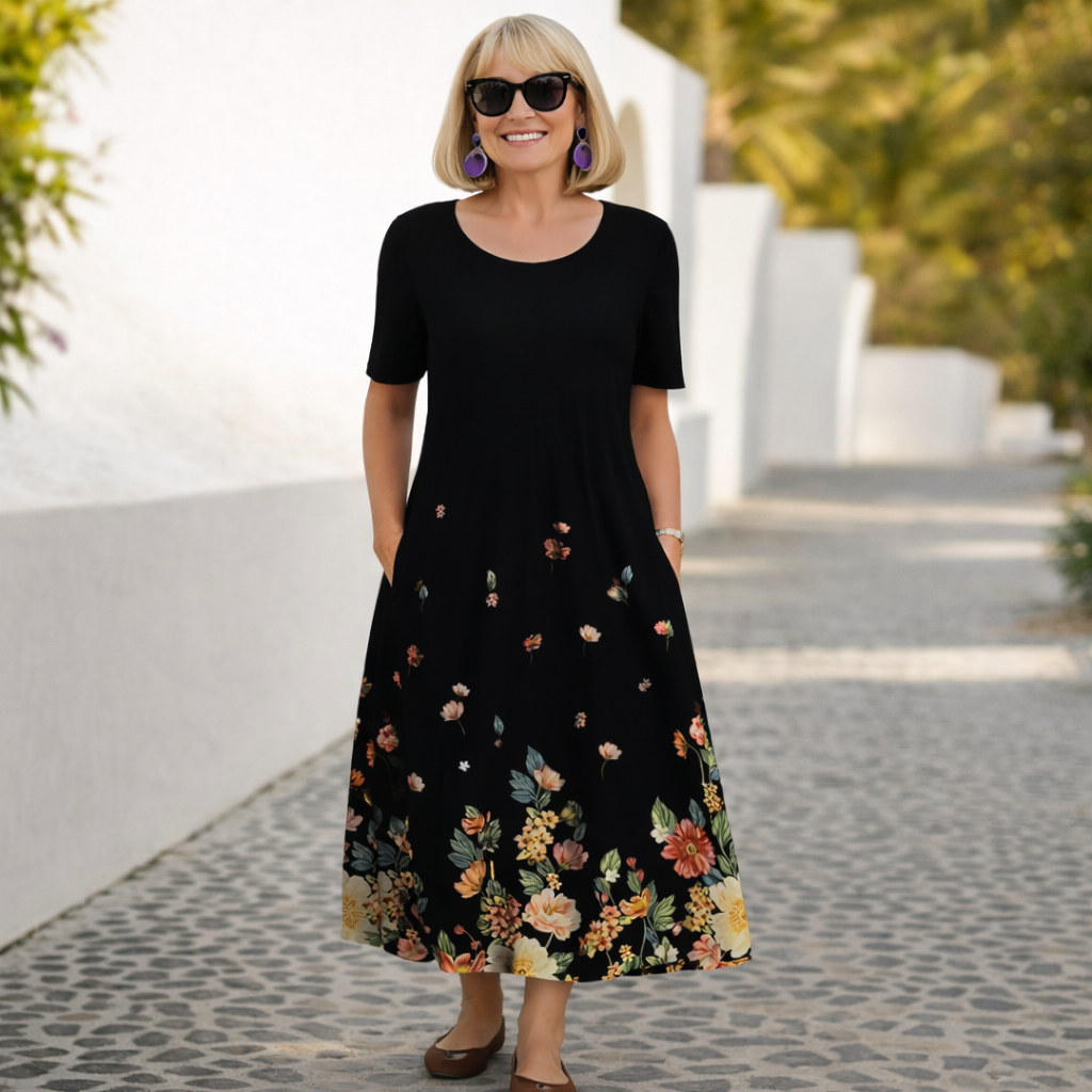 Black midi dress with small floral print and short sleeves