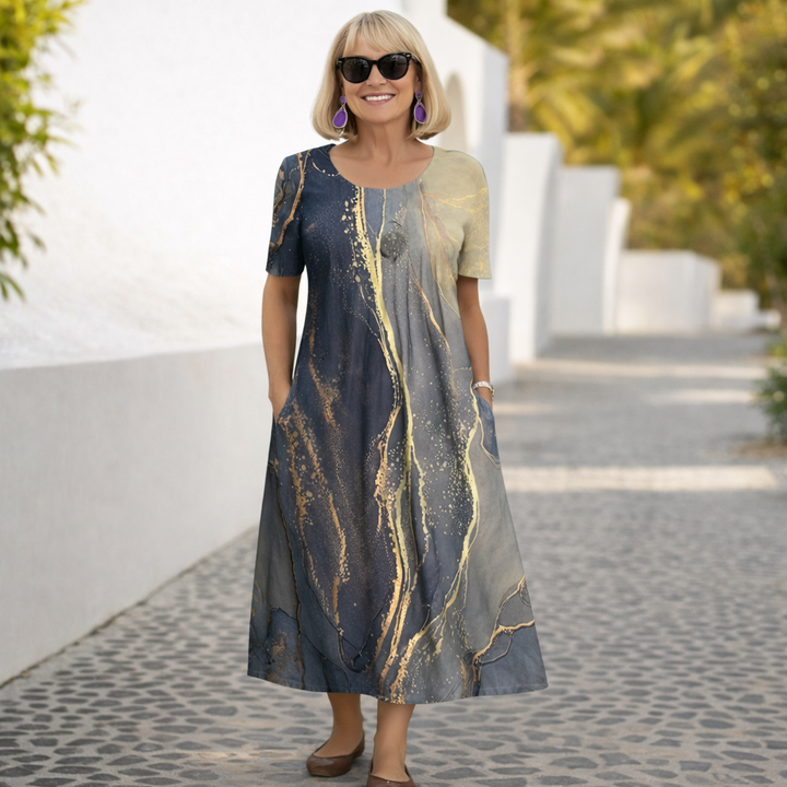 Navy midi dress with abstract gold pattern and short sleeves