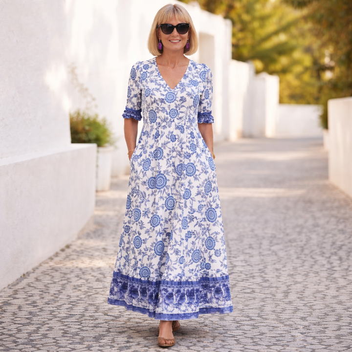 Blue floral tiered maxi dress with V-neck and 3/4 sleeves