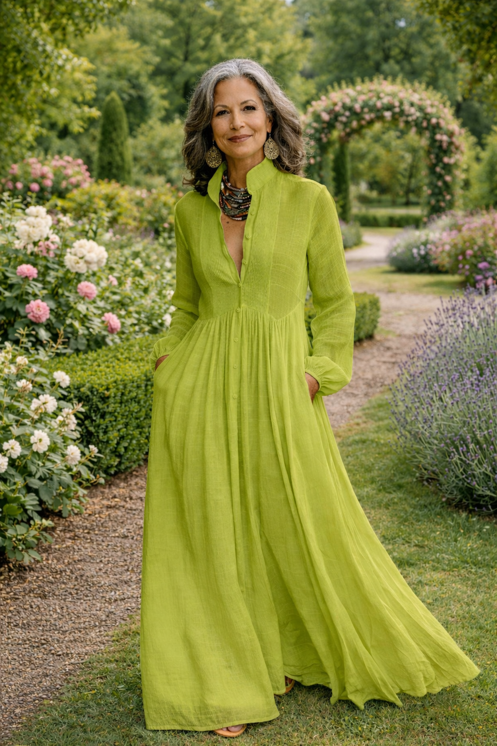 Green button-front maxi dress with V-neck, long sleeves, and flowing tiered skirt