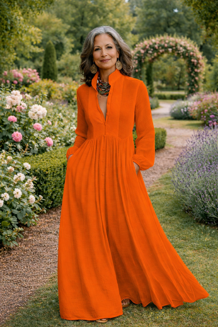 Orange button-front maxi dress with V-neck and flowing gathered skirt