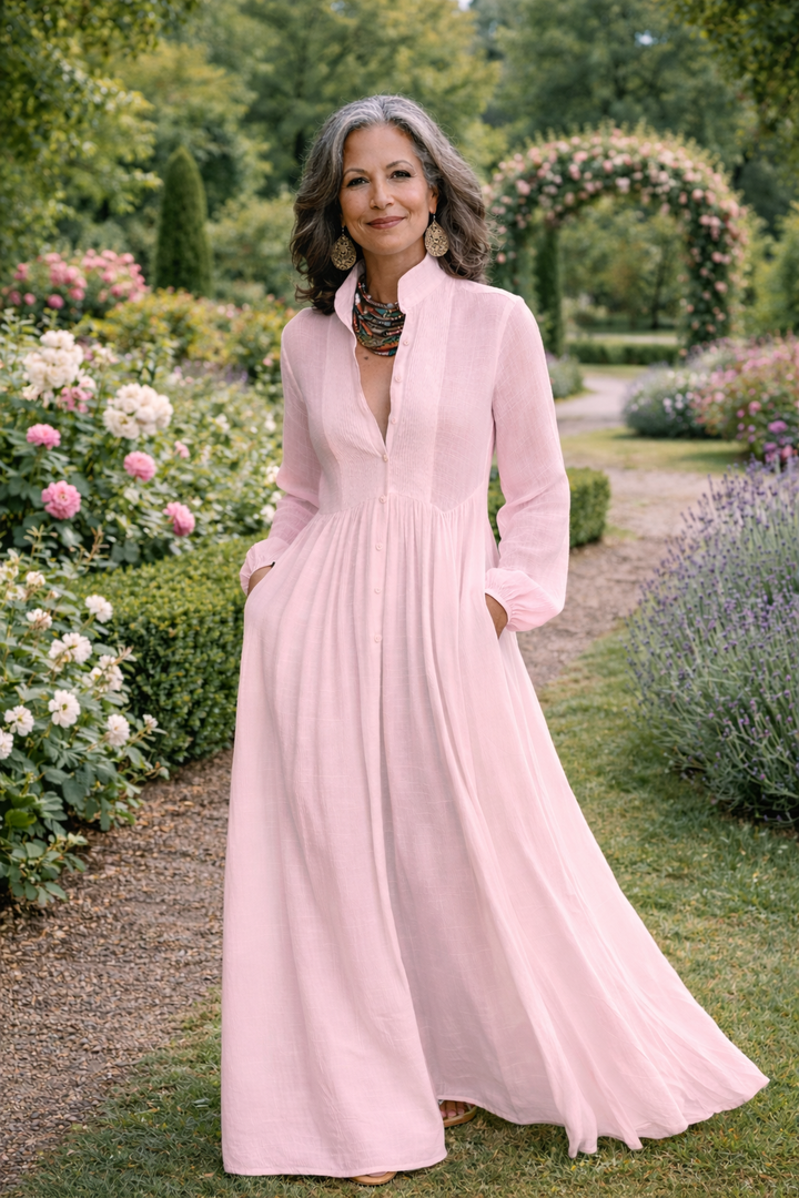 Pink button-front maxi dress with flowing skirt and gathered waist