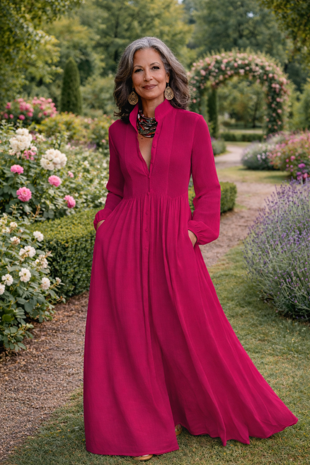 Dark pink button-front maxi dress with long sleeves, pleated bodice, and full hem