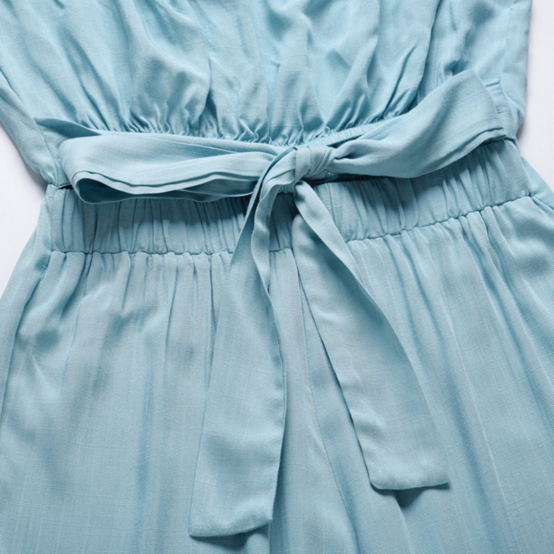 Light blue tie-waist detail with smocked waistband and fabric bow