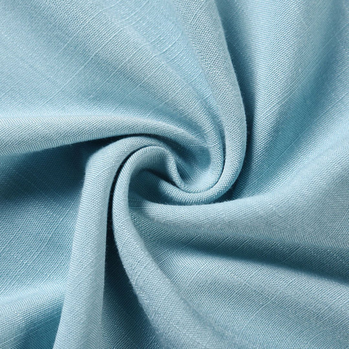 Light blue woven fabric with textured surface close-up