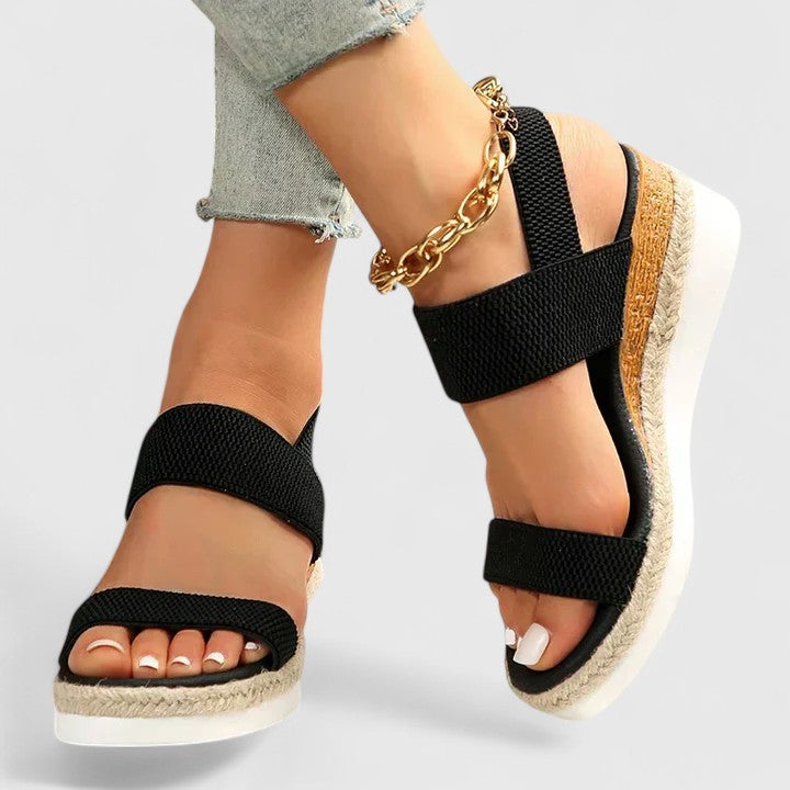 Women’s orthopedic sandals with arch support, black two-strap sandals with gold ankle chain.