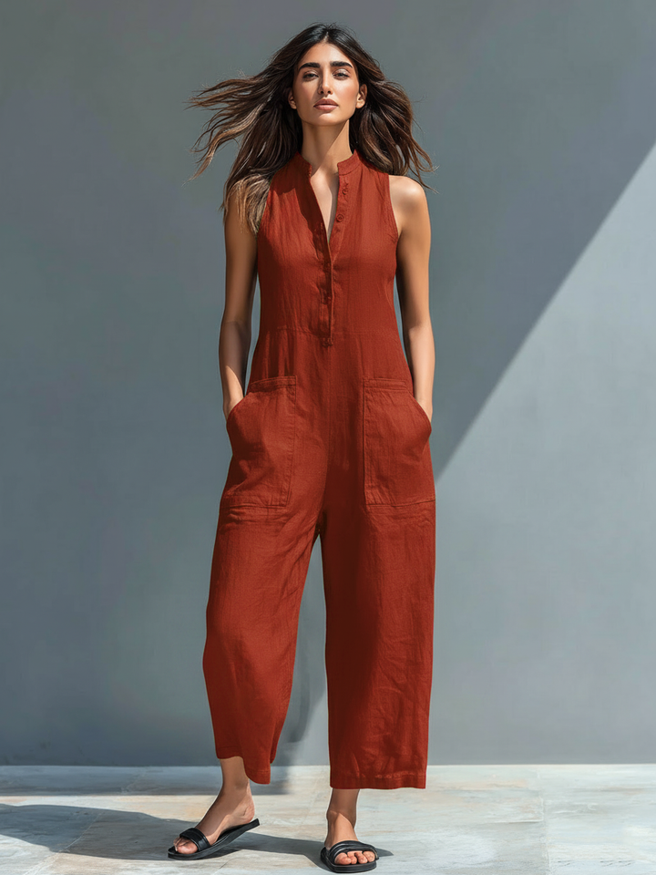 Rust red linen-blend button jumpsuit, sleeveless V-neck with front pockets