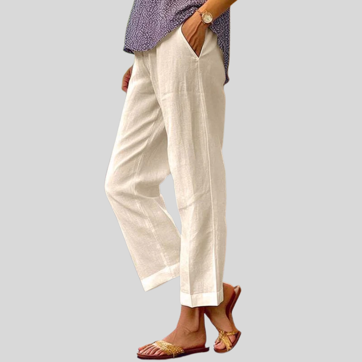 Relaxed summer pants, off-white, wide-leg with side vents and cuffed ankle hem.