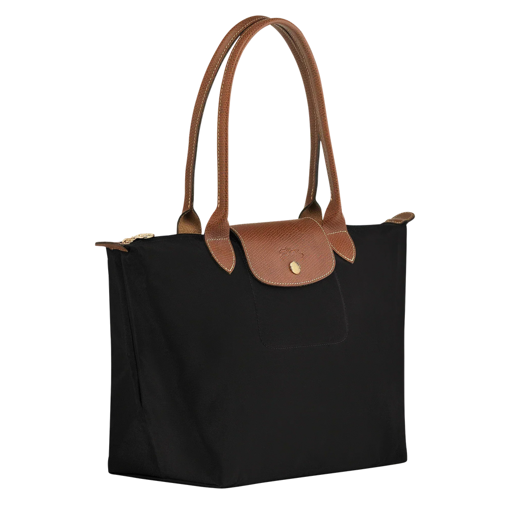 Medium nylon tote bag with black body, brown handles, and top flap with gold snap