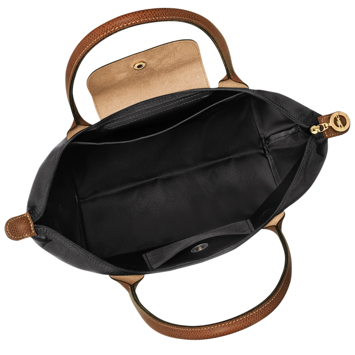 Medium nylon tote bag open interior in black with brown lining, zip closure and gold hardware