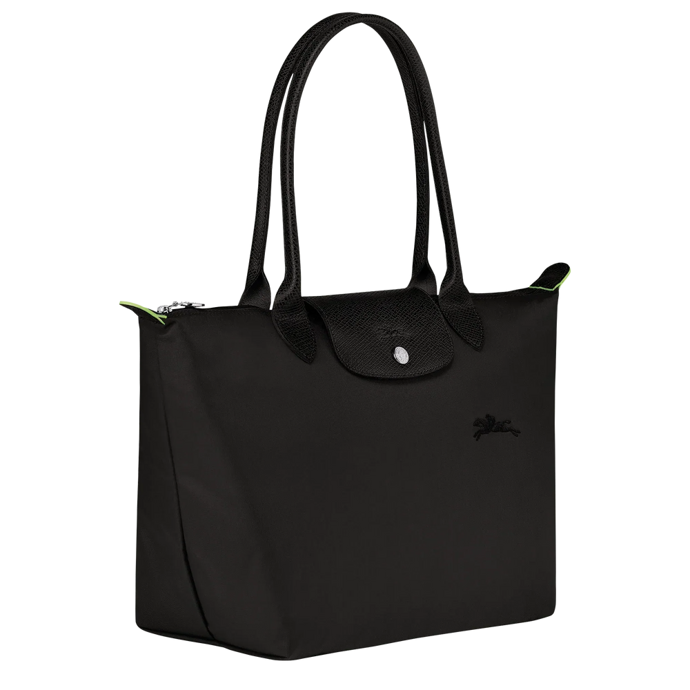 Black nylon tote bag with top handles, front logo, and green piping accents